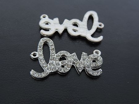Medzikus "LOVE" - 35 x 23 mm - platina - 1ks